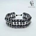 Vista frontale bracciale uomo artigianale Ironhead biker con ematite in argento 925 e acciaio a Riccione Galvani Gioielli