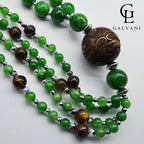 Dettaglio collana Medusa con giada occhio di tigre ematite legno e acciaio Galvani