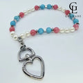Portacellulare bracciale Ancora con perla coltivata tormalina rosa e larimar in acciaio Galvani vista frontale