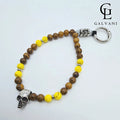 Portacellulare bracciale Azteco con giada gialla persiana elephant skin e teschio in acciaio Galvani vista frontale