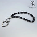 Bracciale portacellulare Incudine con pietre onice ed ematite Galvani stile deciso vista frontale