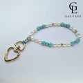 Portacellulare bracciale Nuvola con perla coltivata howlite e turchese in acciaio Galvani vista frontale