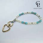 Portacellulare bracciale Nuvola con perla coltivata howlite e turchese in acciaio Galvani vista frontale